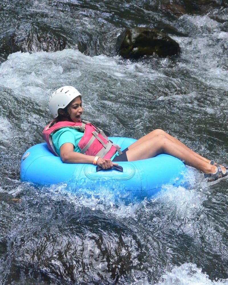 Jungle waterfall beside the tubing river